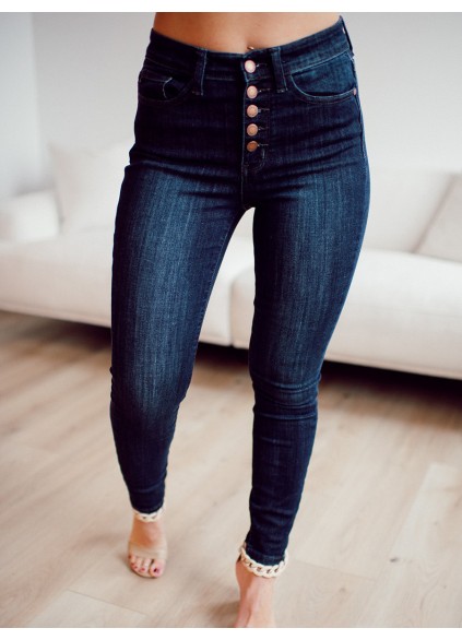 Dark blue high waisted metal button skinny jeans