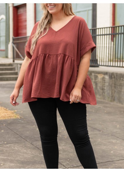 V-neck short sleeved shirt with ruffle hem