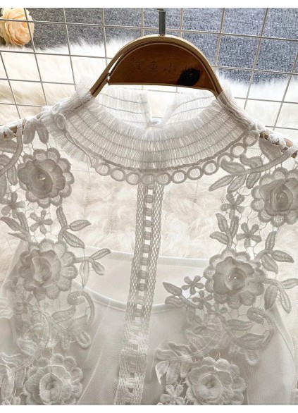 Women's elegant white lace shirt with lantern sleeves