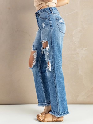 Women's washed ripped fringed jeans