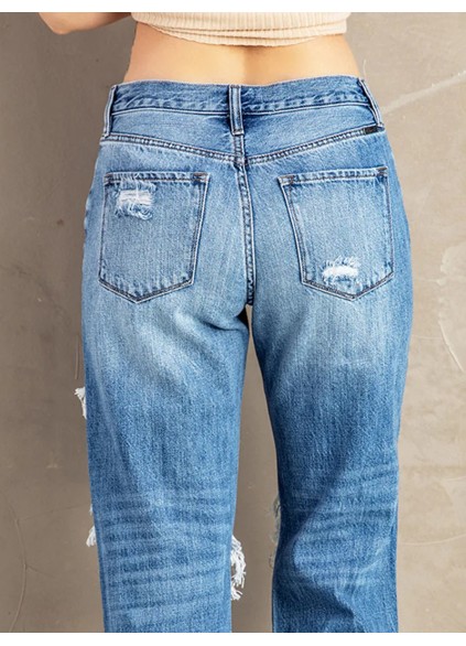 Women's washed ripped fringed jeans