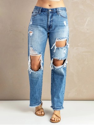 Women's washed ripped fringed jeans