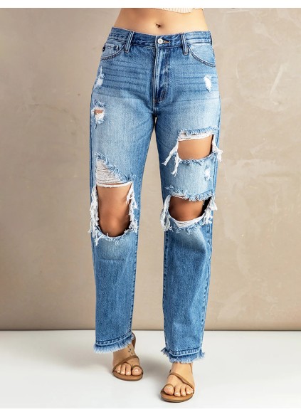 Women's washed ripped fringed jeans