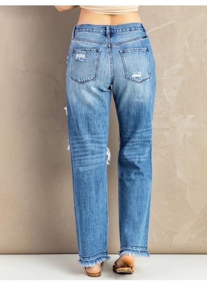 Women's washed ripped fringed jeans